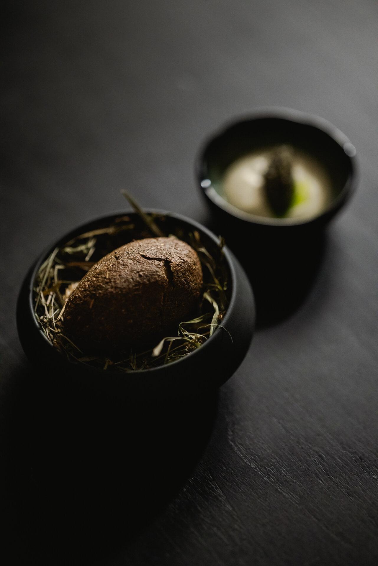potato cooked in summer hay crust with cultured cream with caviar
