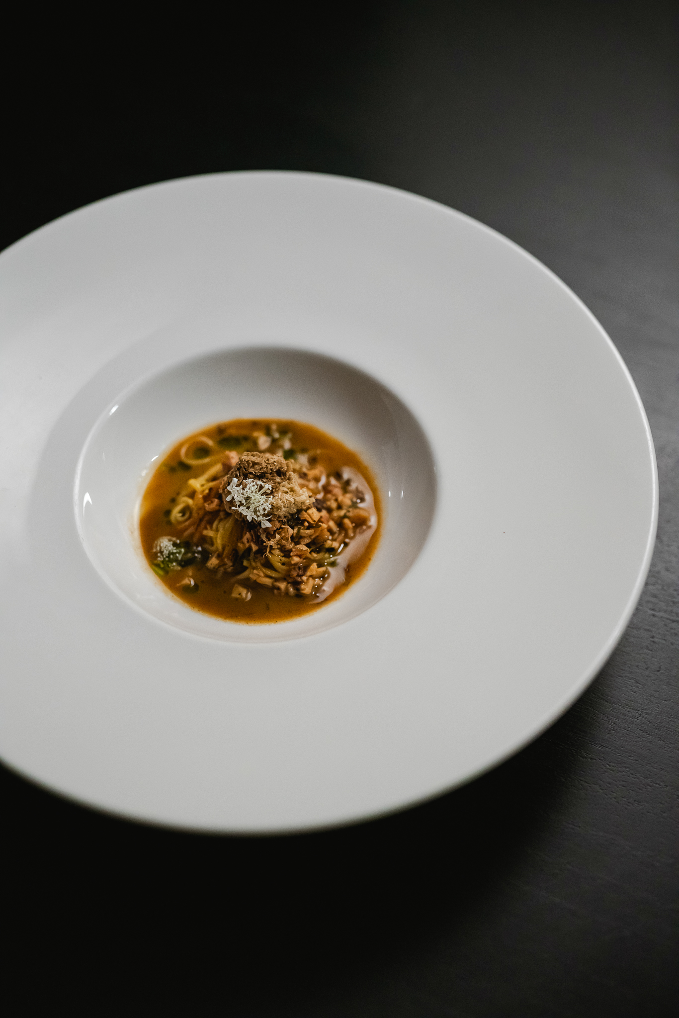 hand-cut tagliolini and mountain rabbit with cocoa nibs and truffles