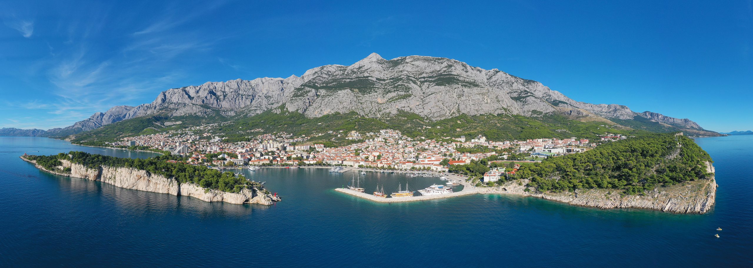 Panorama of Makarska, Biokovo mountain in the background and the sea in the foreground