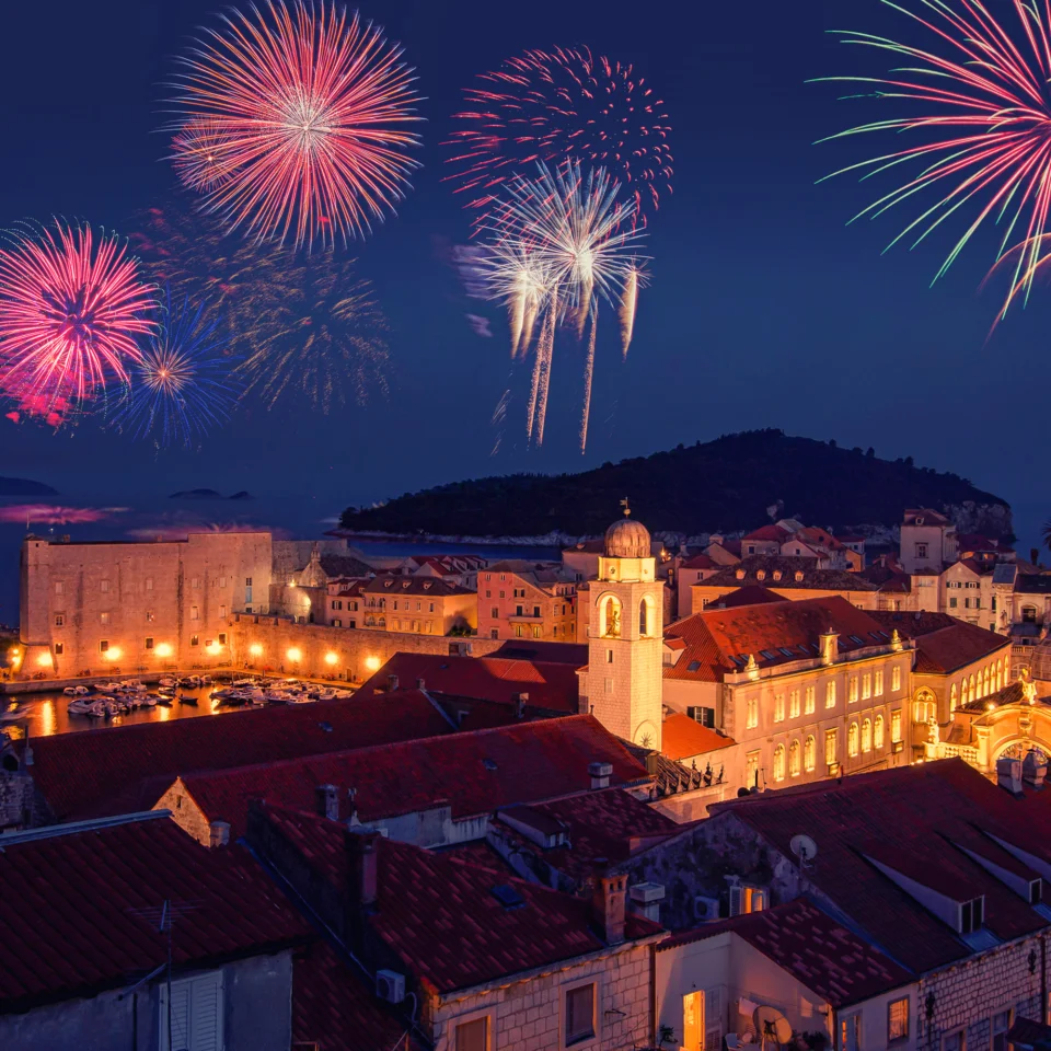 Fireworks light up the historic centre of Dubrovnik and its illuminated city walls during the New Year's celebrations.