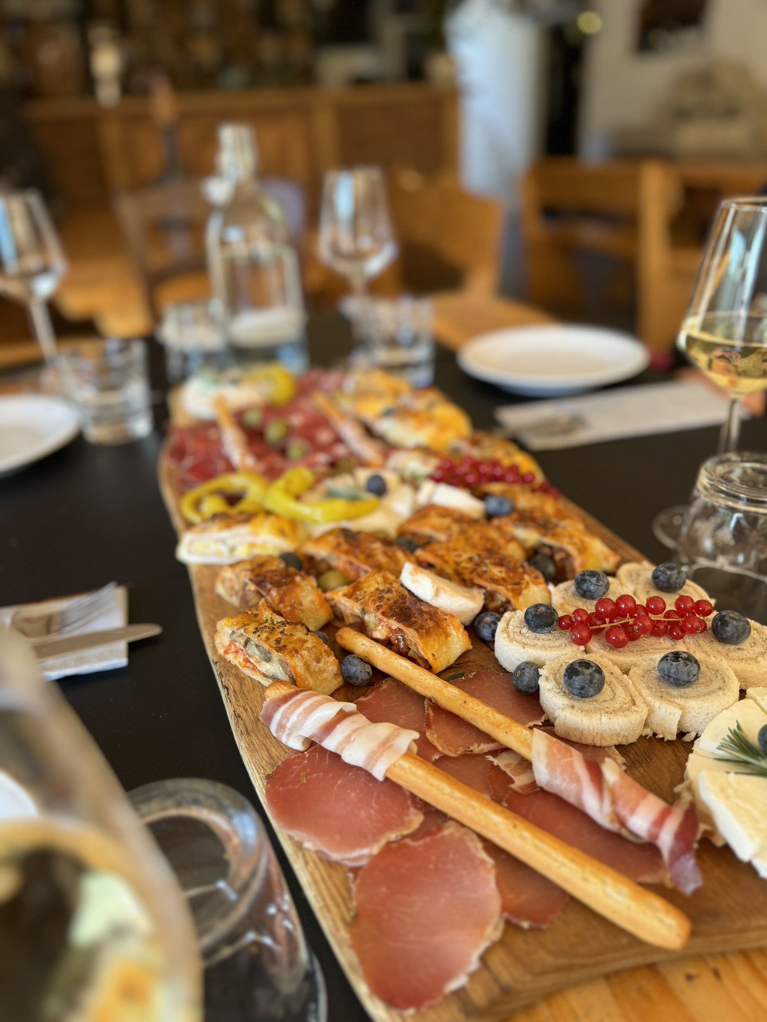 Tasting delicious local food with olive oil and wines