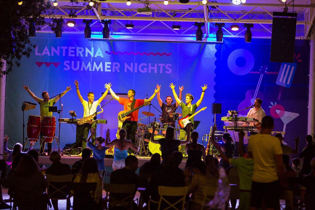 Live band performing on stage at Lanterna Summer Nights