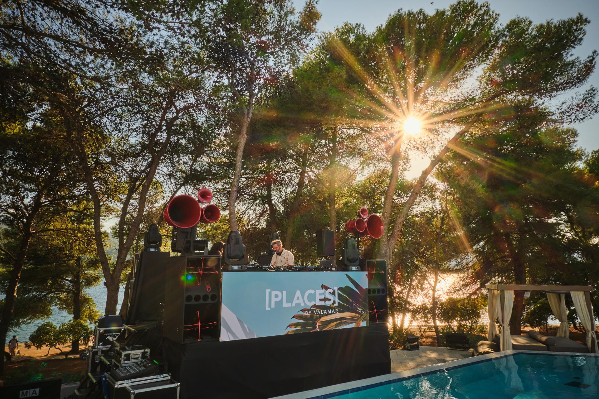 DJ spinning by the pool at [PLACES] Hvar by Valamar