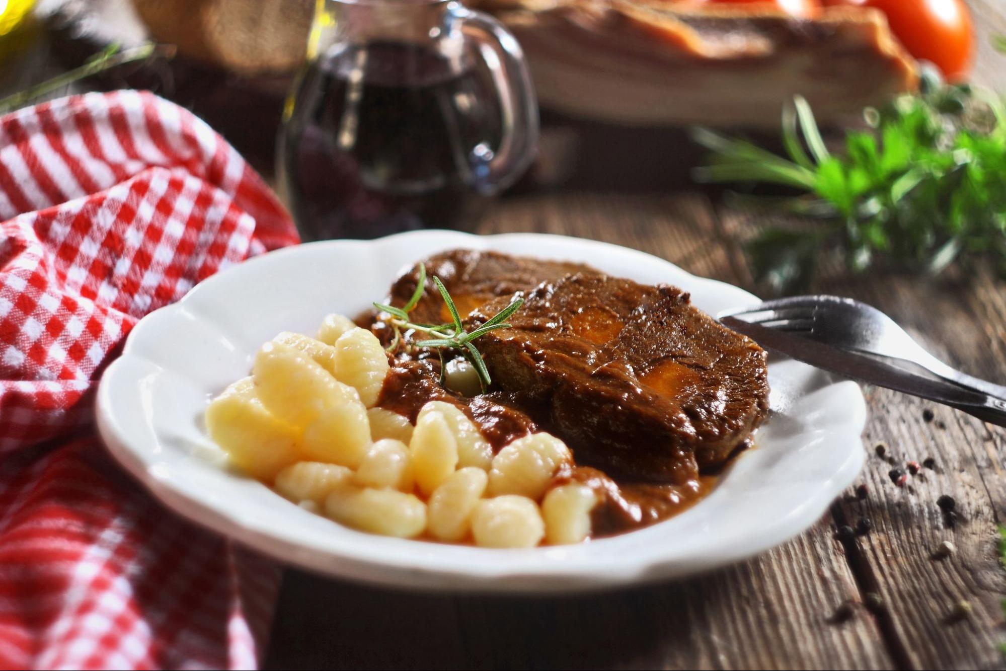 Classic Croatian winter dish - slow-cooked beef pašticada with gnocchi