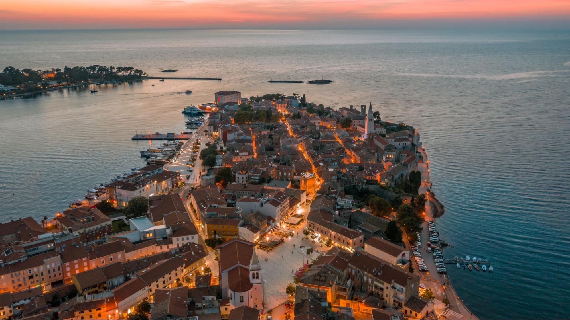Aerial view of Poreč’s historic old town on the peninsula at sunset