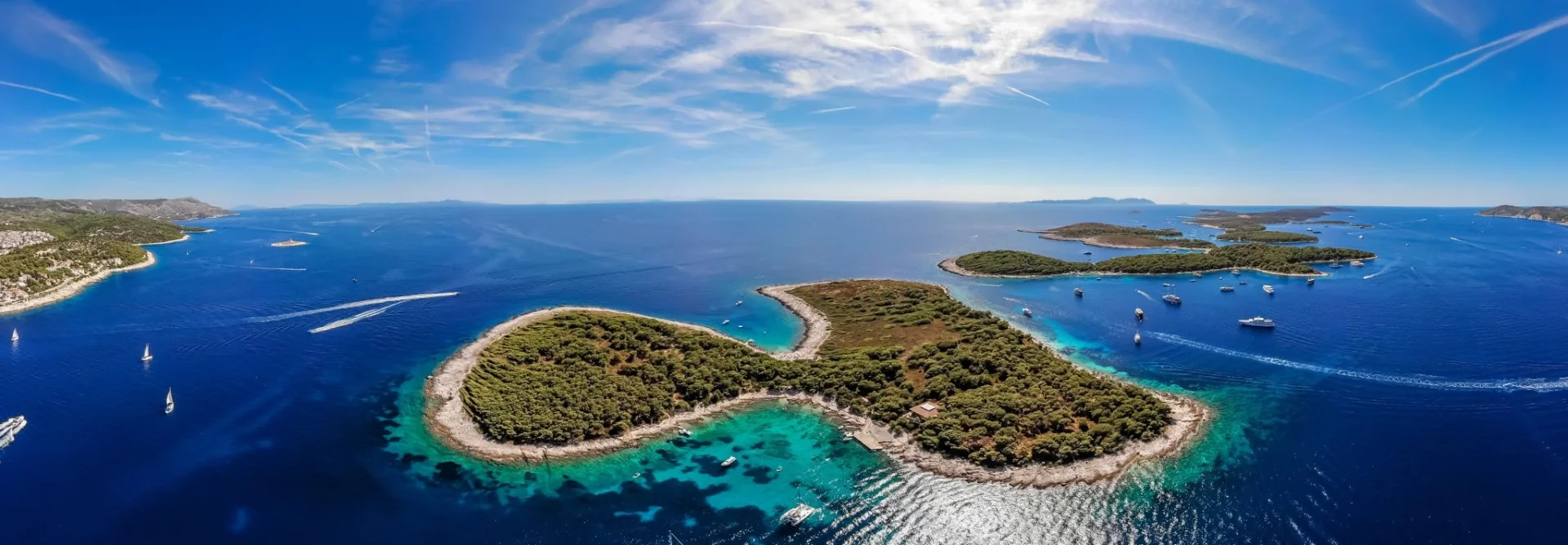Aerial view of the Pakleni Islands near Hvar in Croatia with turquoise Adriatic Sea and sailing boats
