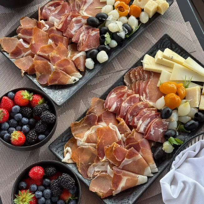 Platters of Istrian prosciutto, cheeses, olives and fresh fruit served aboard the Colnago.