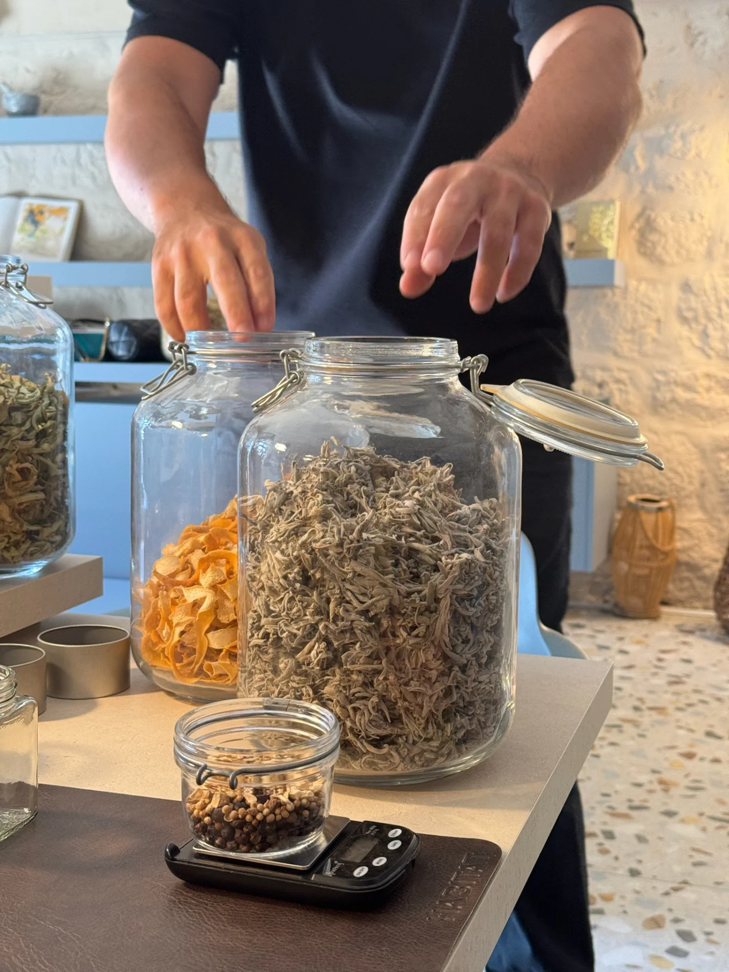 Botanicals and herbs prepared for creating a personalised gin recipe.