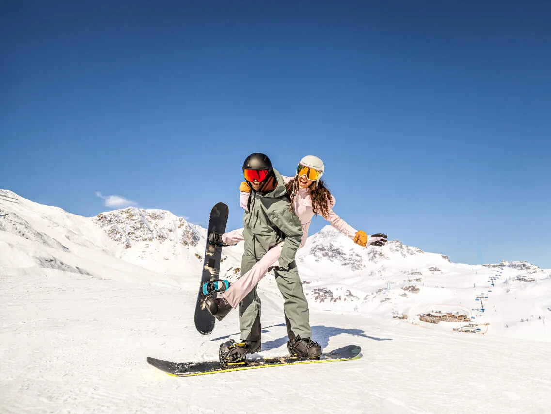 Skiers enjoying a sunny day on the slopes of Obertauern.