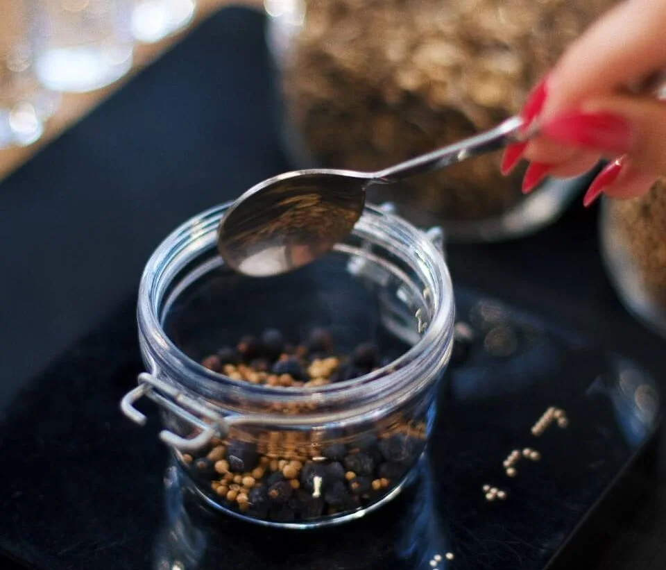 Selecting botanicals for a personalised gin recipe at Habitat Distillery in Dubrovnik