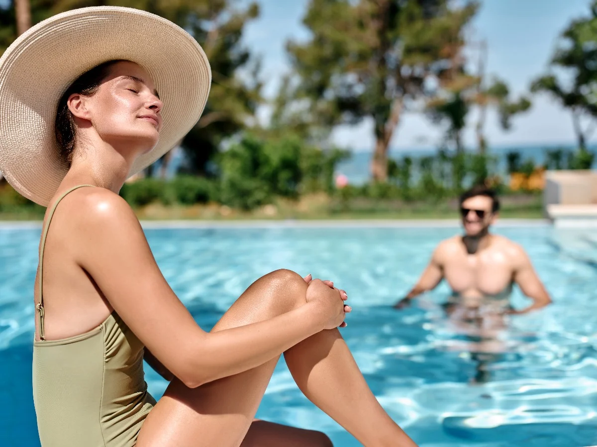 V Level Pool at Pical Resort 5*, an exclusive pool area surrounded by sun loungers and Mediterranean landscaping.