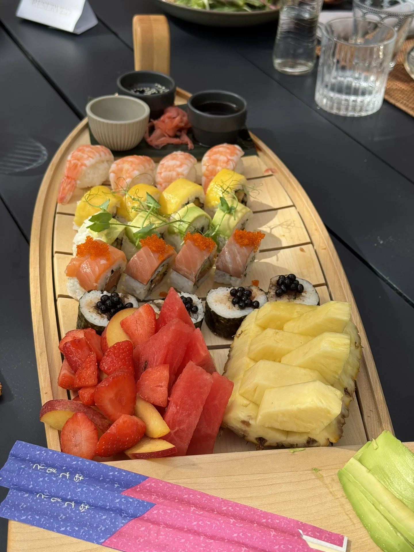 Fresh sushi & fruit platter served at Purobeach Poreč.
