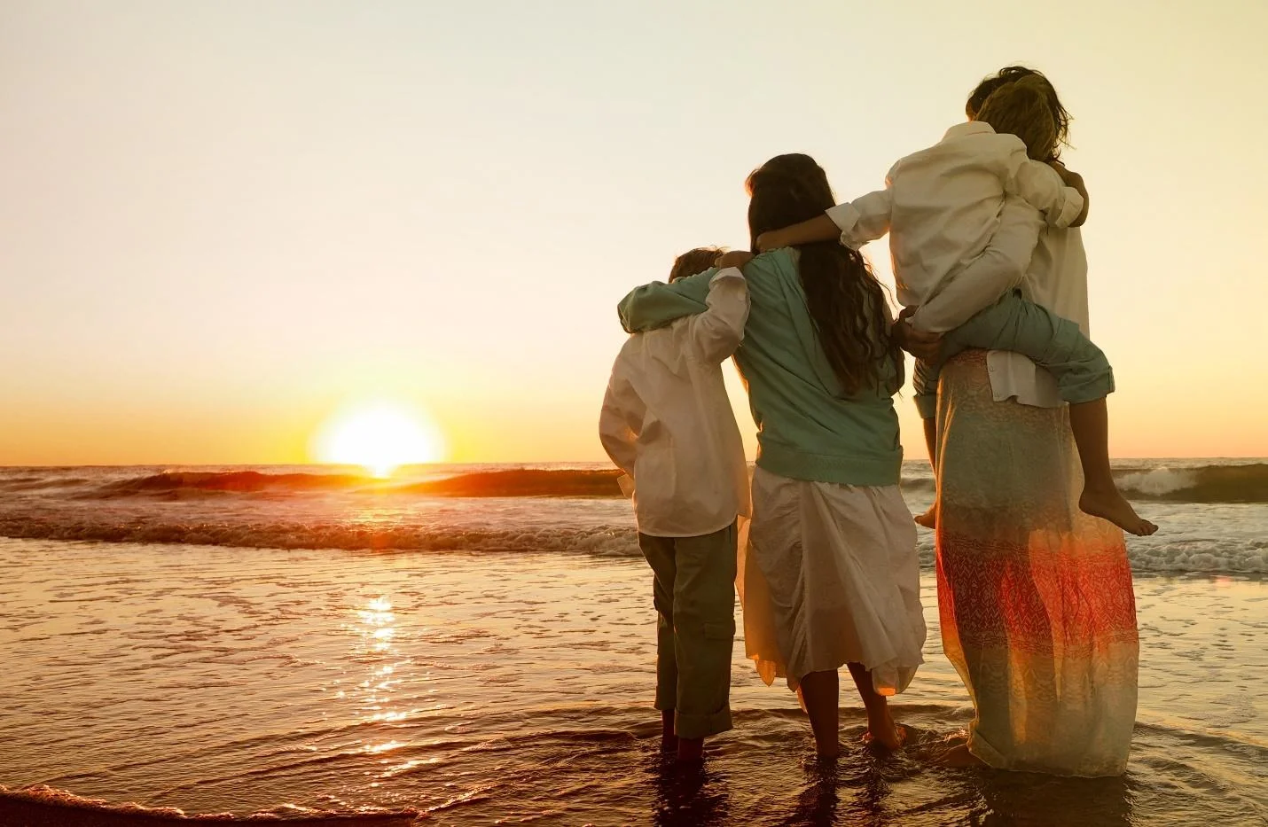 Family enjoying a peaceful evening together while on holiday.